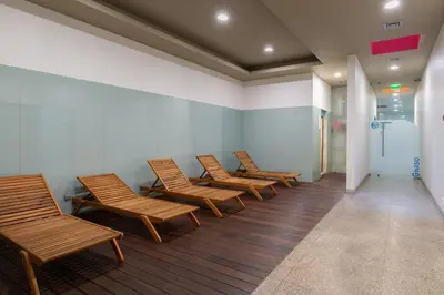 a row of chairs in a waiting room at Premium Flat w/ Pool, Gym & Garage by HostWise in Vila Nova de Gaia
