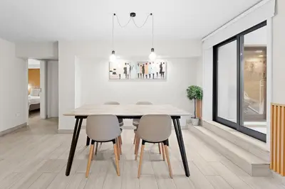 a dining room with a table and chairs at GuestReady - Modern Porto's retreat in Porto