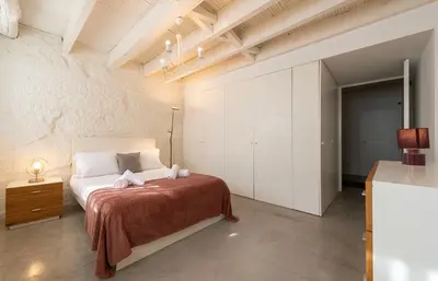 a bedroom with a large bed in a room at NEW! Blue Pearl Apartment in Porto