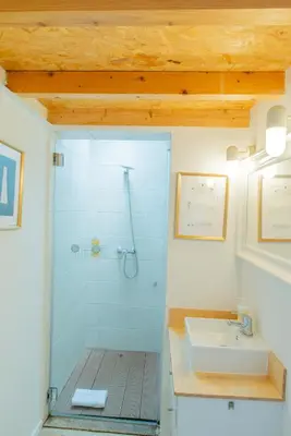 a bathroom with a shower and a sink at VIVA Fontainhas Houses in Porto