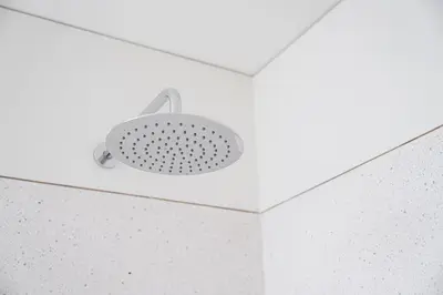 a light on the ceiling of a bathroom at GuestReady - DPV GuestHouse - Apart 6 in Porto
