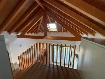 an overhead view of a room with wooden beams at Pinheiro Houses's- Luxury Apartment's by Oporto Soul in Porto