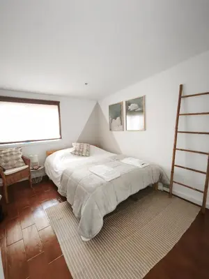 a bathroom with a toilet and a sink and a mirror at Casa da Lapa Porto in Porto