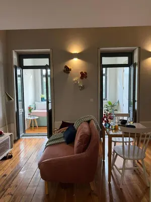 a living room with a couch and a table at Catarina de Alexandria by Porto Stories in Porto