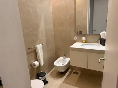 a bathroom with a sink and a mirror at Apartments City Center- Market Bolhão in Porto
