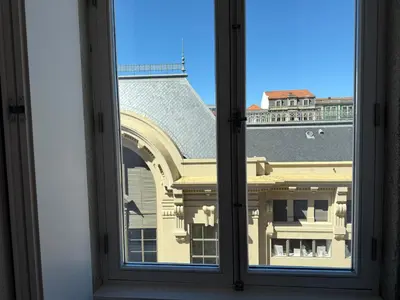 a staircase with a light and a ceiling fan at Apartments City Center- Market Bolhão in Porto