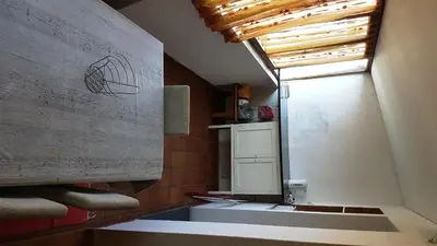 a bathroom with a sink and a window at Apartamento Costa Cabral in Porto