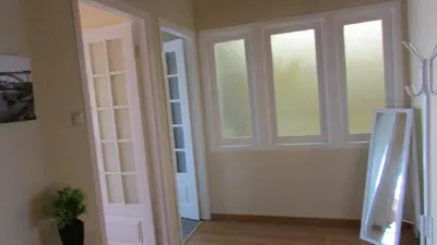 a room with a door and a window at Apartamento Costa Cabral in Porto