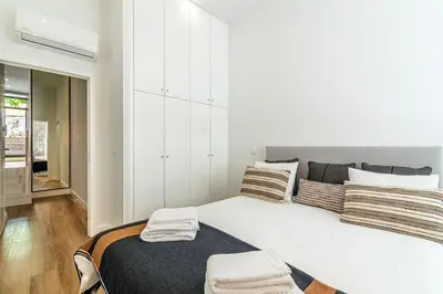 a stack of boxes sitting on top of a table at Heroísmo, stylish 2 bedroom apartment in Porto