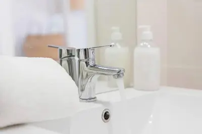 a bathroom sink with a chrome faucet on a counter at Art Wine Loft with oPorto view! in Vila Nova de Gaia