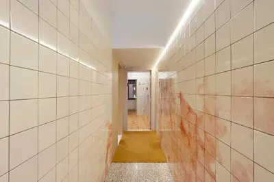 a bedroom with a bed and a door to a closet at Orange Apartments A in Porto