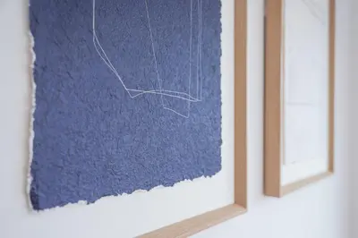 a painting on a wall next to a window at Spacious Studio Apartment in Porto