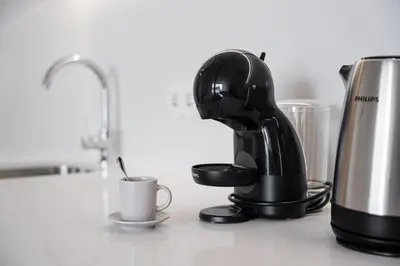 a coffee maker sitting on a counter with a cup at GuestReady - A lovely retreat in Porto in Porto