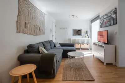 a living room with a couch and a table at GuestReady - Relaxing getaway in Santos Pousada in Porto