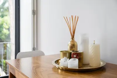 a table with a candle and a plate with candles at GuestReady - Urban paradise in Porto in Porto