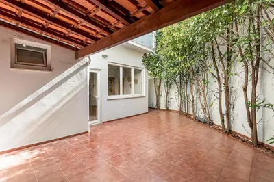 an empty courtyard with trees in a house at GuestReady - Central & spacious apartment in Porto in Porto
