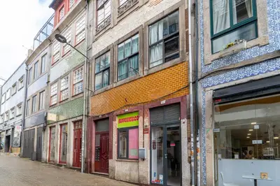 a row of buildings on the side of a street at Microloft in the heart of Porto in Porto