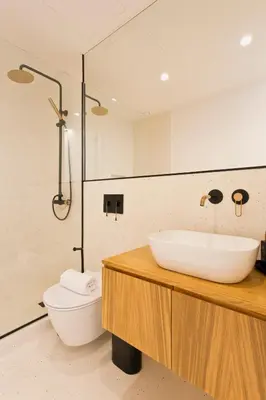 a bathroom with a sink and a toilet at Porto - Boavista Casa Da Música- Art Gallery Apartment III in Porto