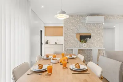 a living room with a couch and a table at Urban Comfort @ Bonfim Boutique Flats in Porto
