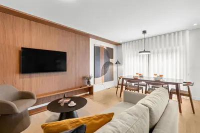 a living room with a couch and a table at Urban Flow @ Bonfim Boutique Flats in Porto