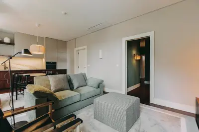 a living room with a couch and a table at Gran Cruz Apartments in Vila Nova de Gaia