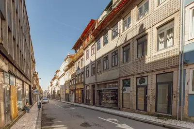 an empty street in a city with buildings at Downtown Formosa Studio by Vacationy in Porto