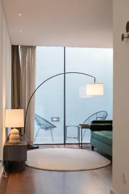 a living room with a couch and a table at Liiiving in Porto - The Prestige Apartment C in Porto