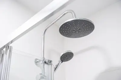 a shower with a shower head in a bathroom at GuestReady - charming retreat in Porto in Porto