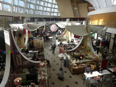 an overhead view of a shopping mall with people in it at Carolina M Apartment in front of Metro in Porto