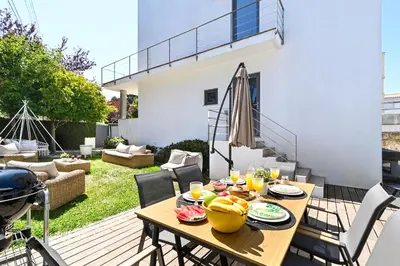 a large blue swimming pool with a gym at Luxury House by ON Apartments in Porto