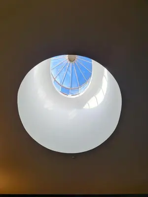 a glass ceiling with a window in a building at Condes de Azevedo Palace Apartments in Porto