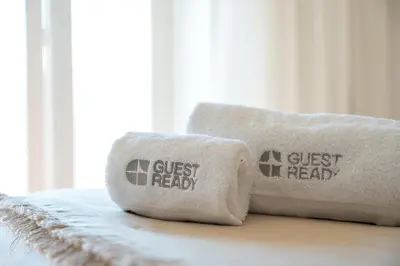 a couple of pillows sitting on top of a bed at GuestReady - Fantastic house in the city center in Porto