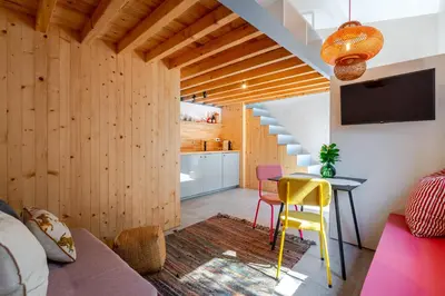 a bathroom with a toilet and a sink and a shower at Kleine's House in Porto - Mezzanine Boavista in Porto