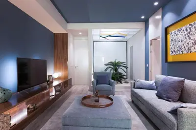 a living room with a couch and a tv at Charming Flat - Garage by Host Wise in Porto