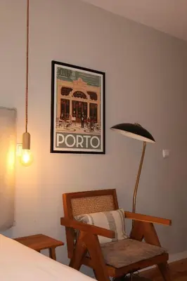 two bottles of soap sitting on top of a bath tub at Porto Central Apartment in Porto