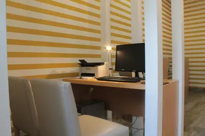 an office with a desk with a computer on it at Seculo Soft in Porto