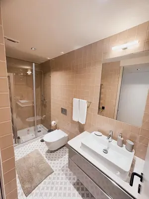 a bathroom with a sink and a toilet and a shower at Casa de Santa Catarina by OportoSoul in Porto