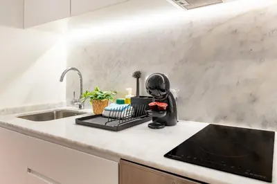 a kitchen counter with a mixer on a counter top at Oporto Center Studio in Porto