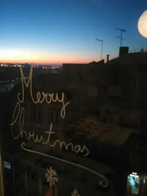 a view from a window of a city at sunset at Lulapartment II in Porto