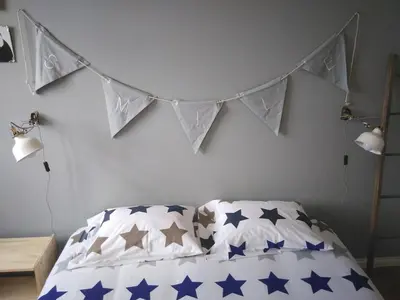 a bedroom with a bed with stars on it at Lulapartment II in Porto