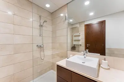 a bathroom with a sink and a shower at GuestReady - cosy retreat in Vila Nova de Gaia in Vila Nova de Gaia