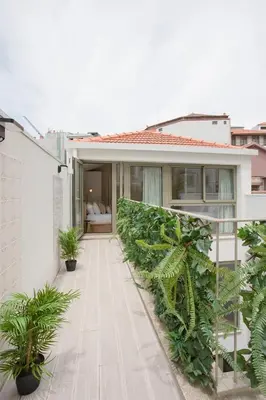 a balcony of a house with plants at GuestReady - Soho urban retreat in Porto
