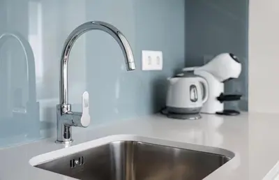 a white bathroom with a sink and a mirror at Bolhão Luxe Retreat 2 in Porto