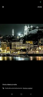 a view of a city at night with buildings at portochique AL7 in Porto