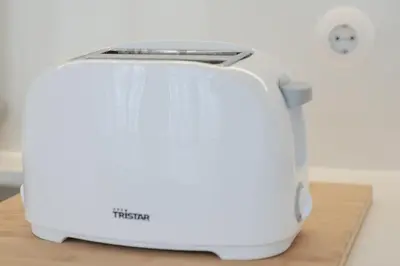 a white toaster sitting on top of a counter at Modern Flat With Balcony on Rua das Flores - 1st in Porto