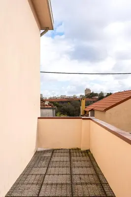a balcony with a view of a city at GuestReady - Charming Gaia apartment in Vila Nova de Gaia