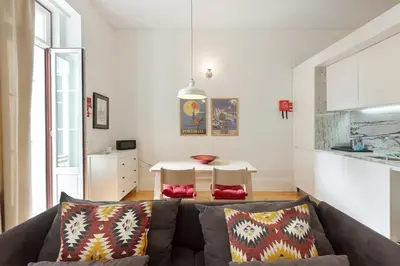 a living room with a couch and a table at Breiner House Porto in Porto