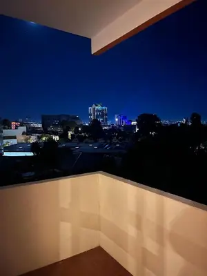 a view of a city skyline at night at Good View Studio in Porto