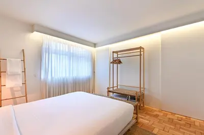 a small dining room with a table and chairs at Sleep in Office by ON Apartments in Porto