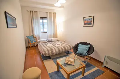 a living room with a couch and a table at Sta. Catarina Home in Porto